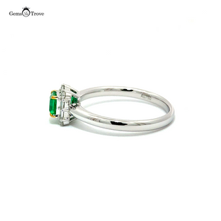 Delicate gold band with octagonal Muzo emerald 