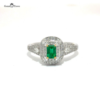 Beautiful white gold ring showcasing a natural Colombian emerald and white diamonds, a timeless choice for an engagement or wedding band.
