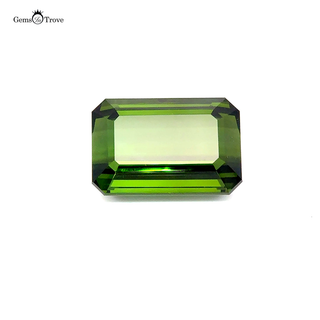 A 29.65ct olive green rectangular tourmaline gemstone on a white background.