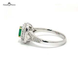 Exquisite white gold ring showcasing a natural Colombian emerald and brilliant diamonds, a timeless choice for any special occasion.