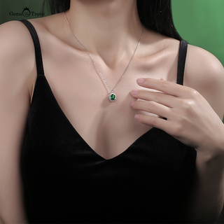 Oval Emerald Halo Pendant
