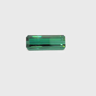 360° spin of a 27.87ct rectangular green tourmaline showing clarity and color brilliance.